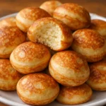 breakfast pancake poppers golden brown crispy edges stack of homemade pancakes on plate with maple syrup